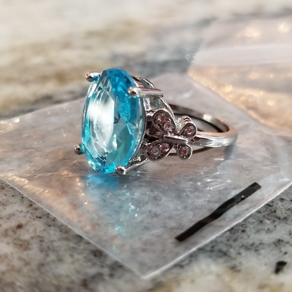 Beautiful lab blue Topaz gorgeous butterflies ring size 6 available - Picture 2 of 2